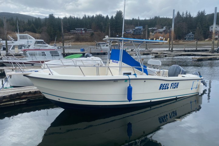 a boat is docked in the water